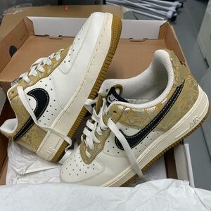 Metallic gold air force ones